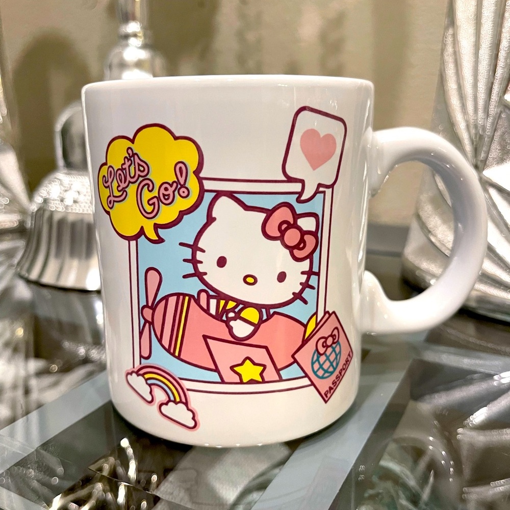 Hello Kitty "Let's Go”
Travel Destination 20 Oz. Ceramic Mug - Brand: Sanrio